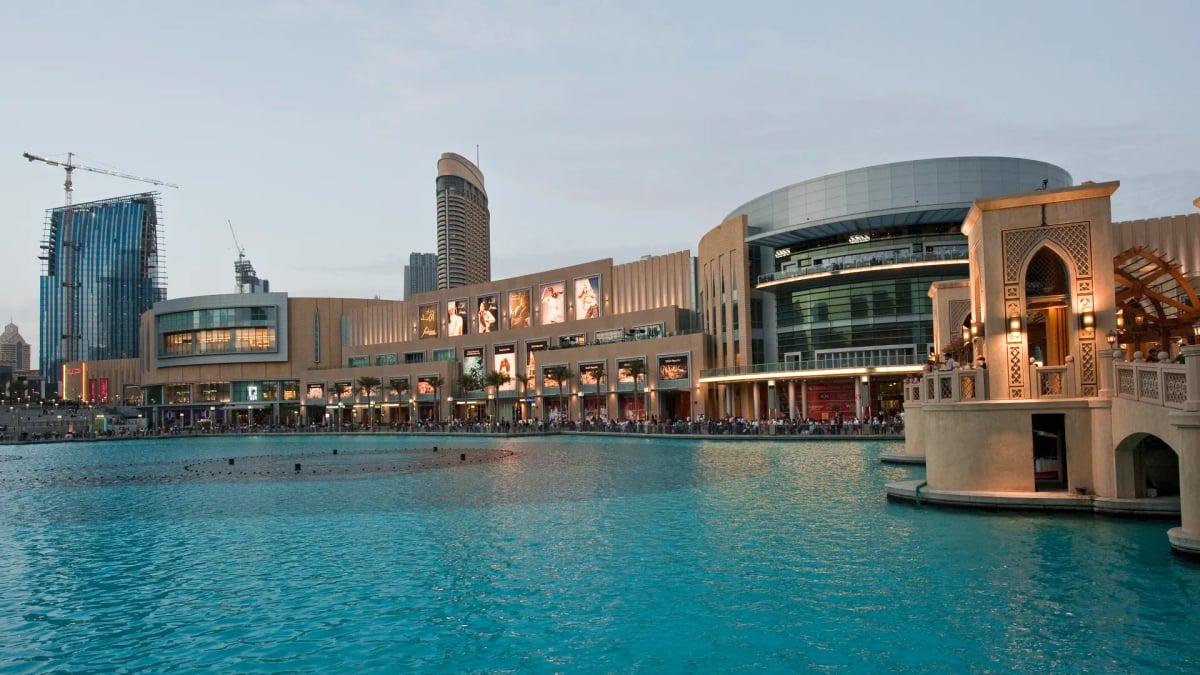 The Dubai Mall's facade and Souk Al Bahar across Burj Lake