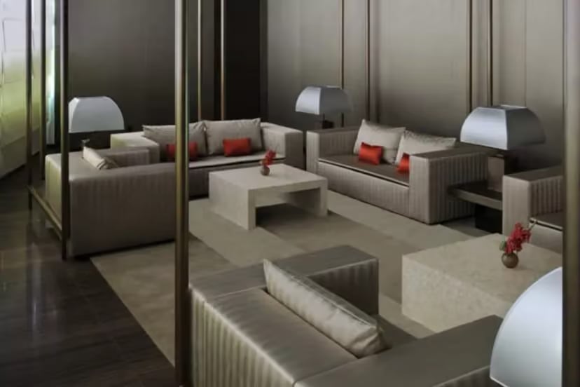 Armani Hotel's Al Majlis lounge, gray sofas with red cushions